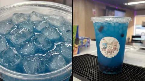 A blue creamy soda up close